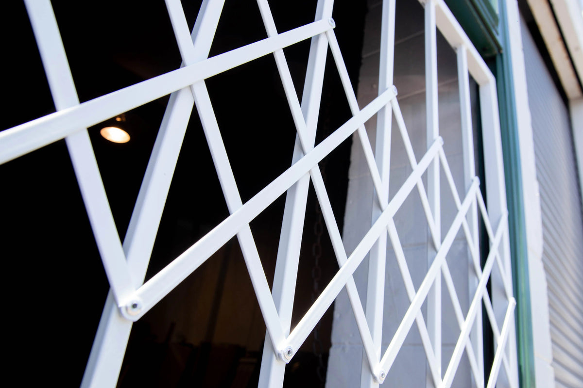 Trellis style steel security gate with decorative design for residential entrances