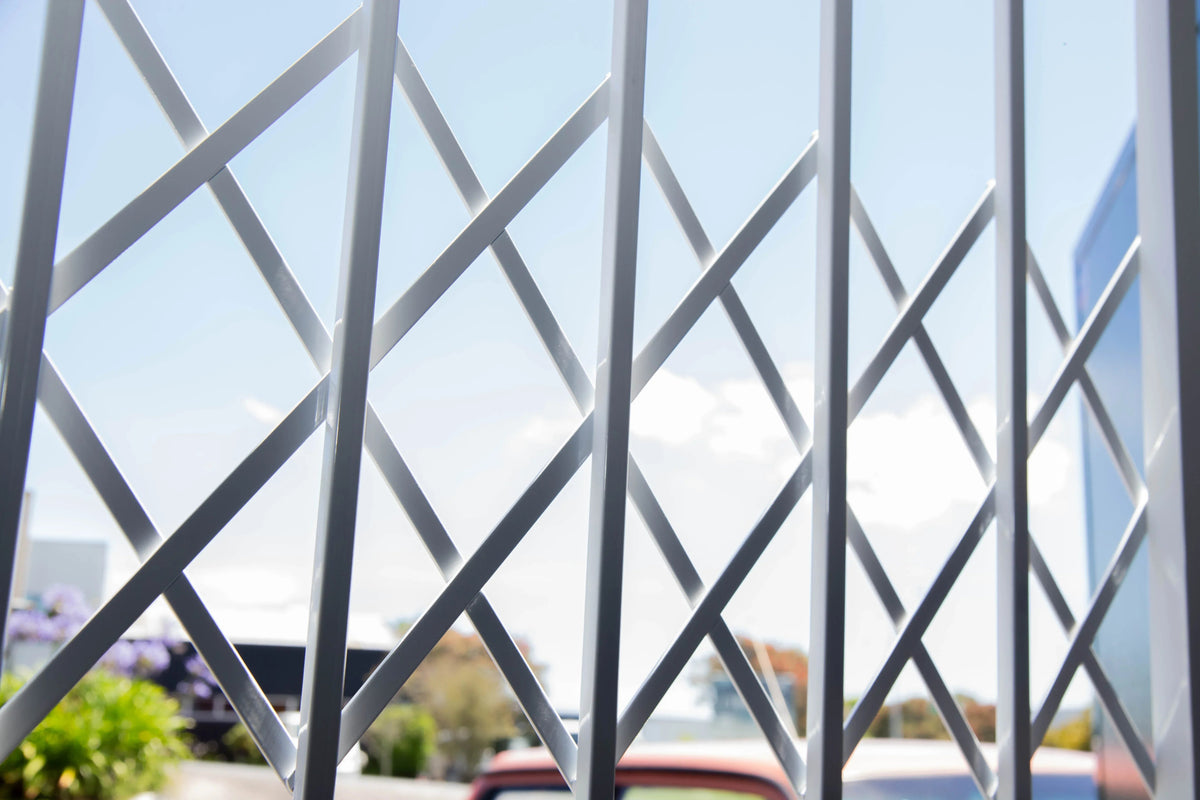 Trellis style steel security gate with decorative design for residential entrances