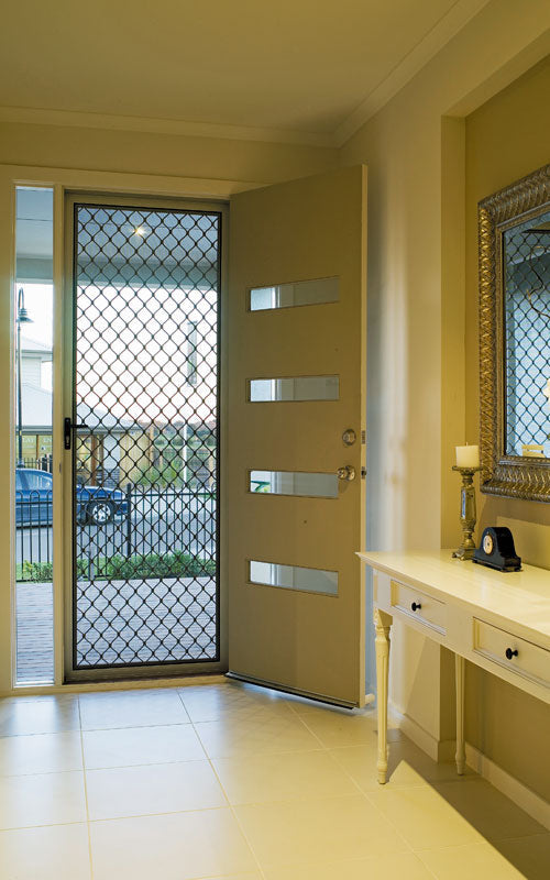 Amplimesh security screen installed on residential doorway