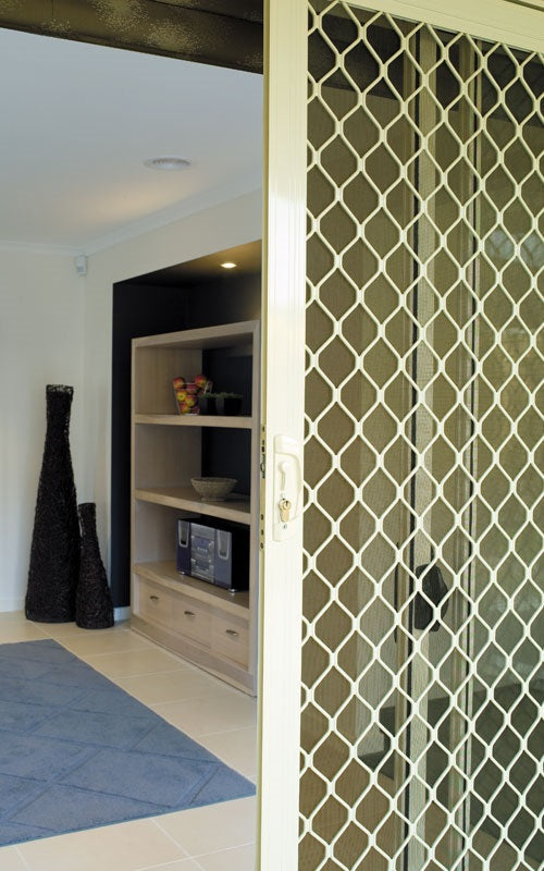 Amplimesh security screen installed on residential doorway