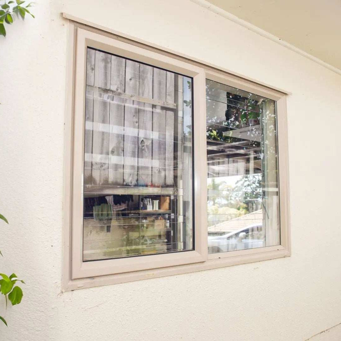 Clear Guard transparent window protection installed on residential window