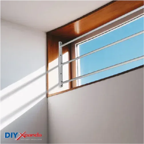 Black extendable steel window bars installed on a residential window for security protection