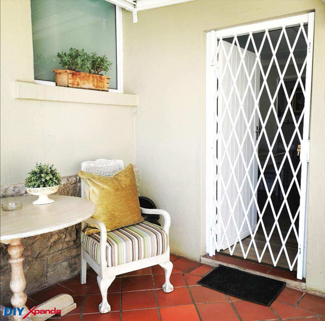 Saftidor retractable security grille installed on residential doorway