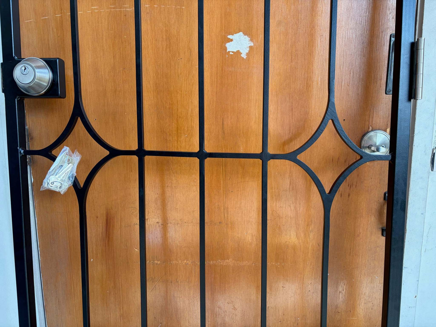 Fixed swing security gate with decorative centre design - close up