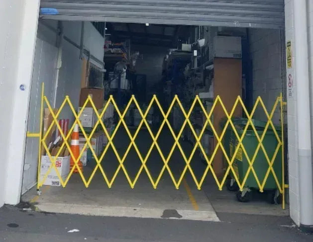 Yellow expandable barrier adjustable scissor gate barrier available for Pedestrian Barrier Rental as well