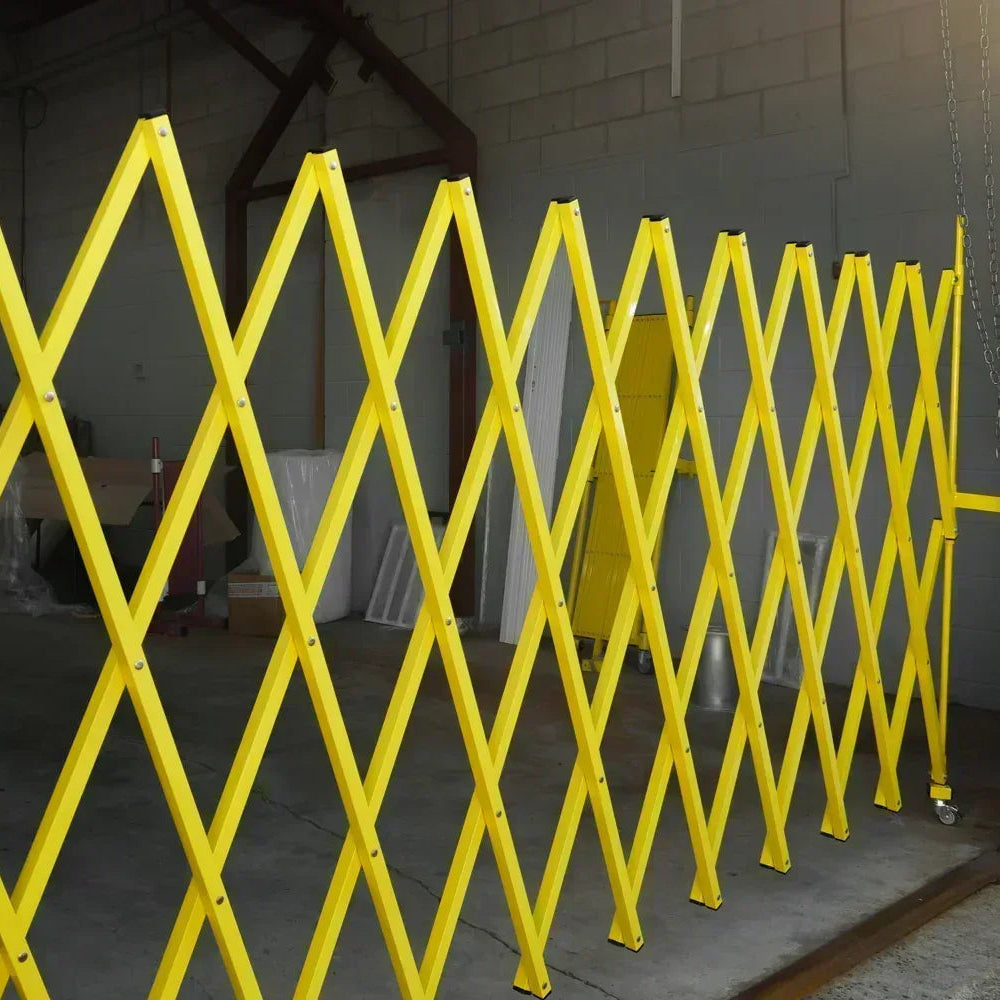 Yellow expandable barrier adjustable scissor gate barrier available for Pedestrian Barrier Rental as well