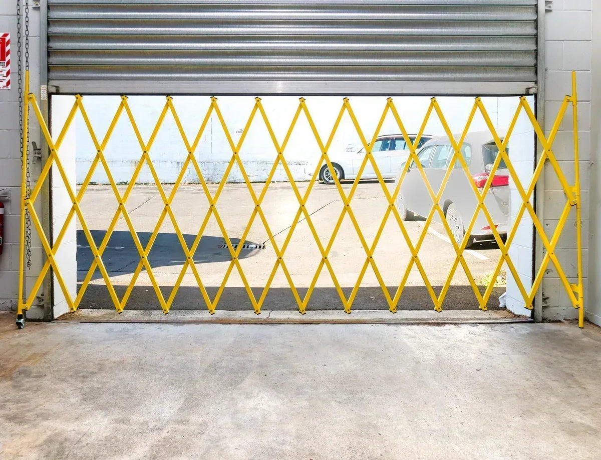 Yellow expandable barrier adjustable scissor gate barrier available for Pedestrian Barrier Rental as well
