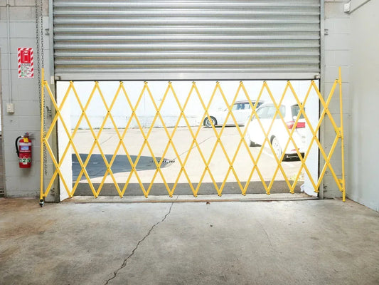 Yellow expandable barrier adjustable scissor gate barrier available for Pedestrian Barrier Rental as well