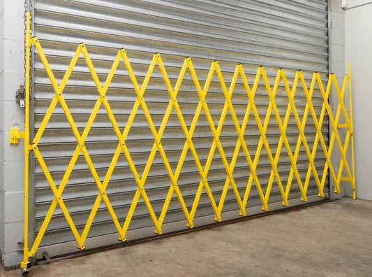 Yellow expandable barrier adjustable scissor gate barrier available for Pedestrian Barrier Rental as well