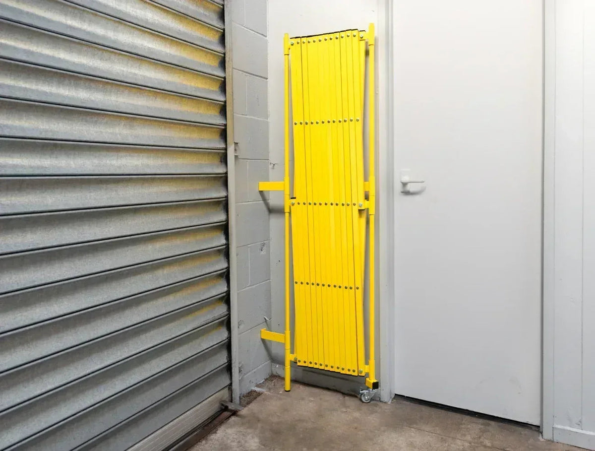 Yellow expandable barrier adjustable scissor gate barrier available for Pedestrian Barrier Rental as well
