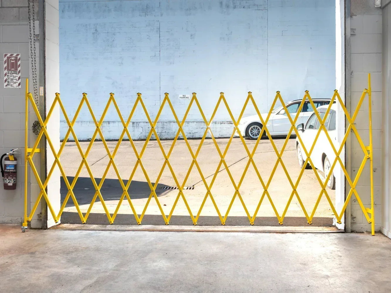 Yellow expandable barrier adjustable scissor gate barrier available for Pedestrian Barrier Rental as well
