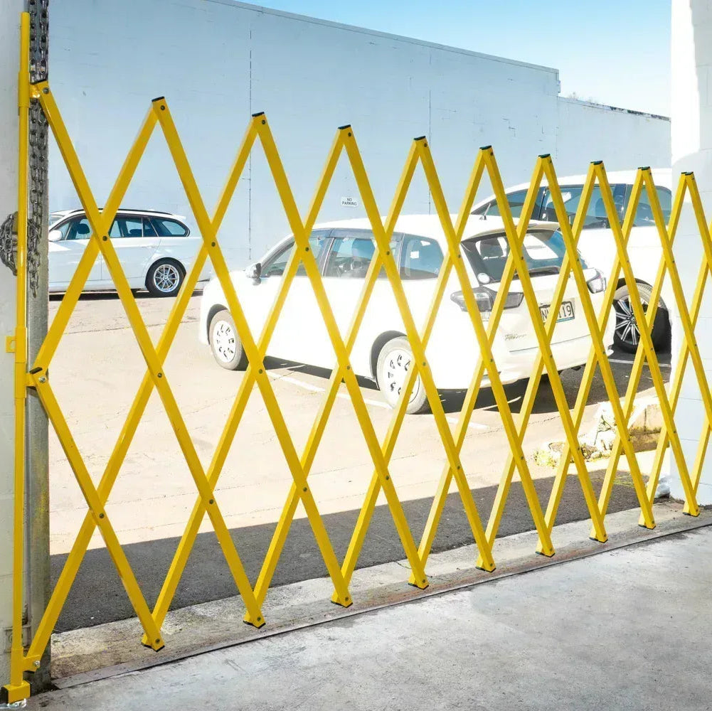 Yellow expandable barrier adjustable scissor gate barrier available for Pedestrian Barrier Rental as well