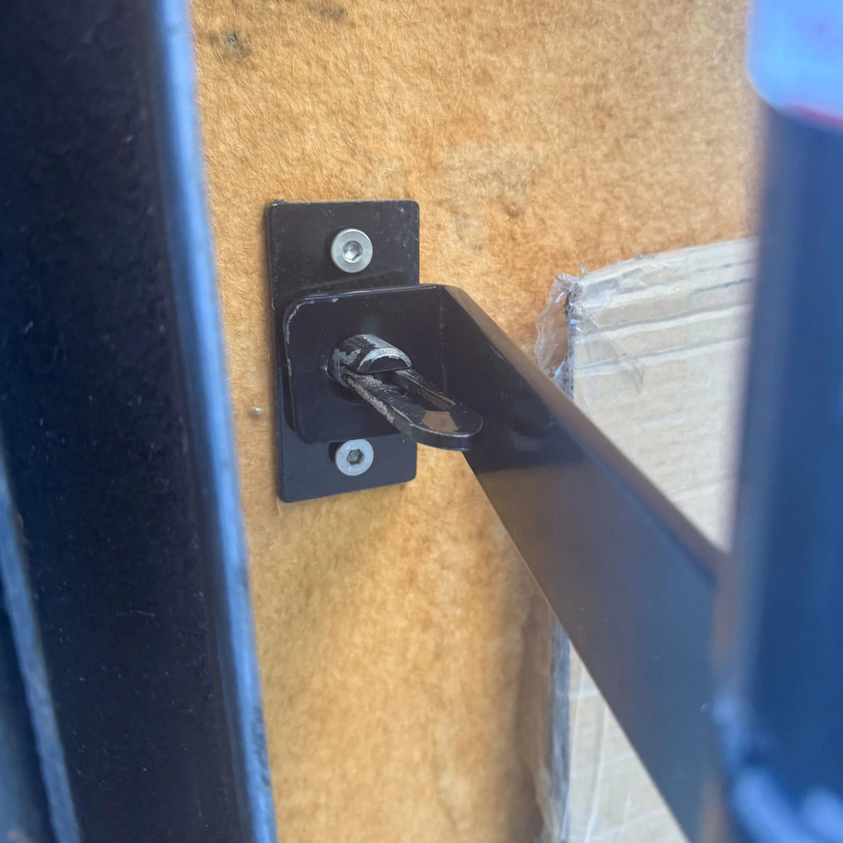 Black expandable barrier with adjustable scissor gate design for access control and safety management