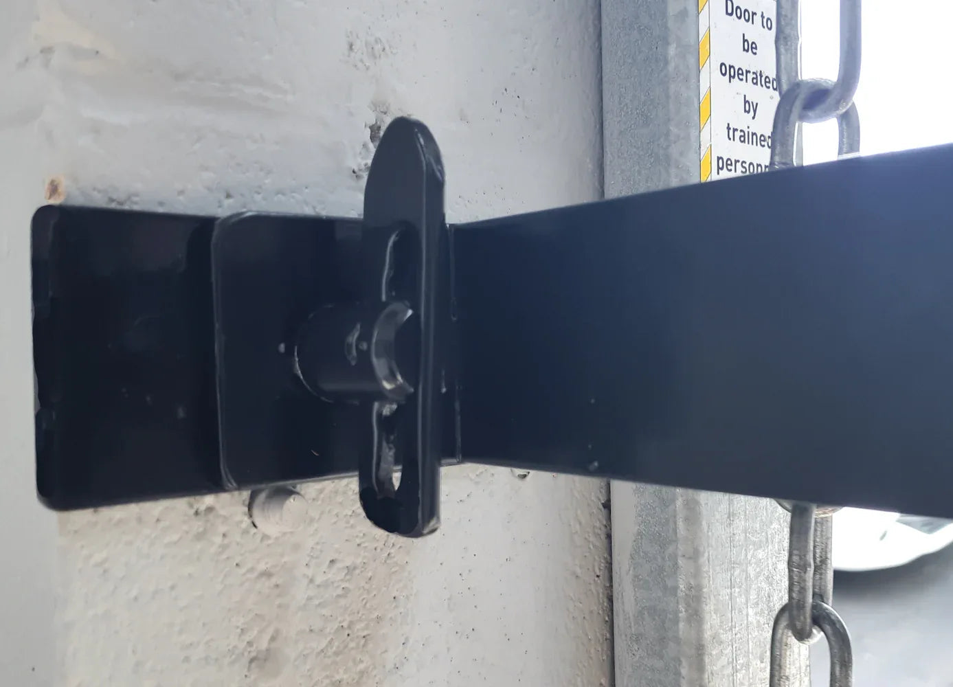 Black expandable barrier with adjustable scissor gate design for access control and safety management