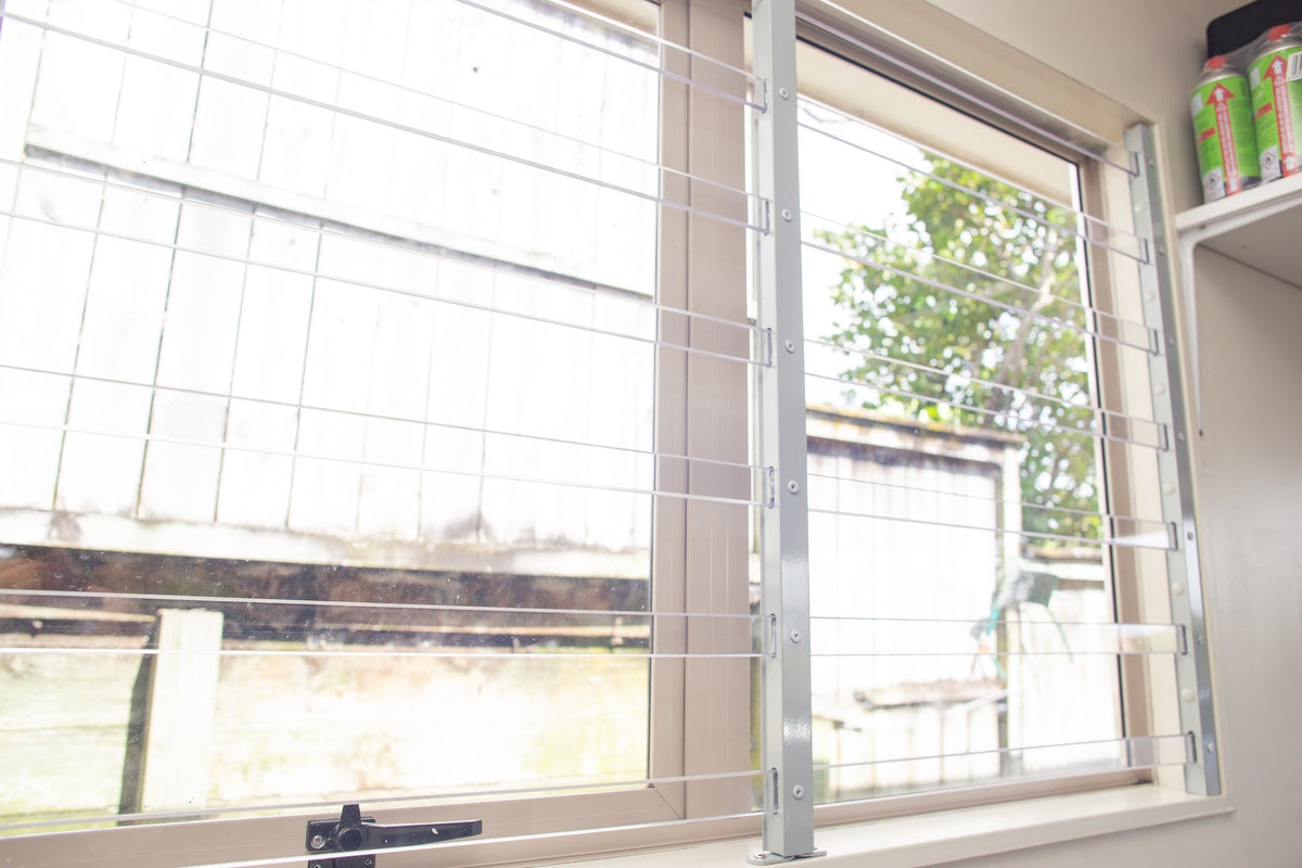 Clear Guard transparent window protection installed on residential window