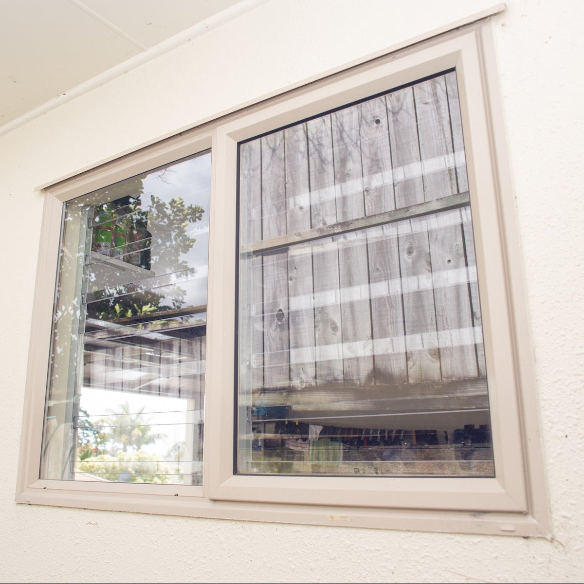 Clear Guard transparent window protection installed on residential window