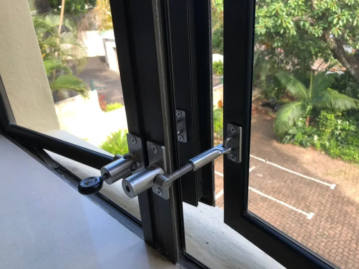PetLatch window latch for pet doors secure ventilation and sliding window security