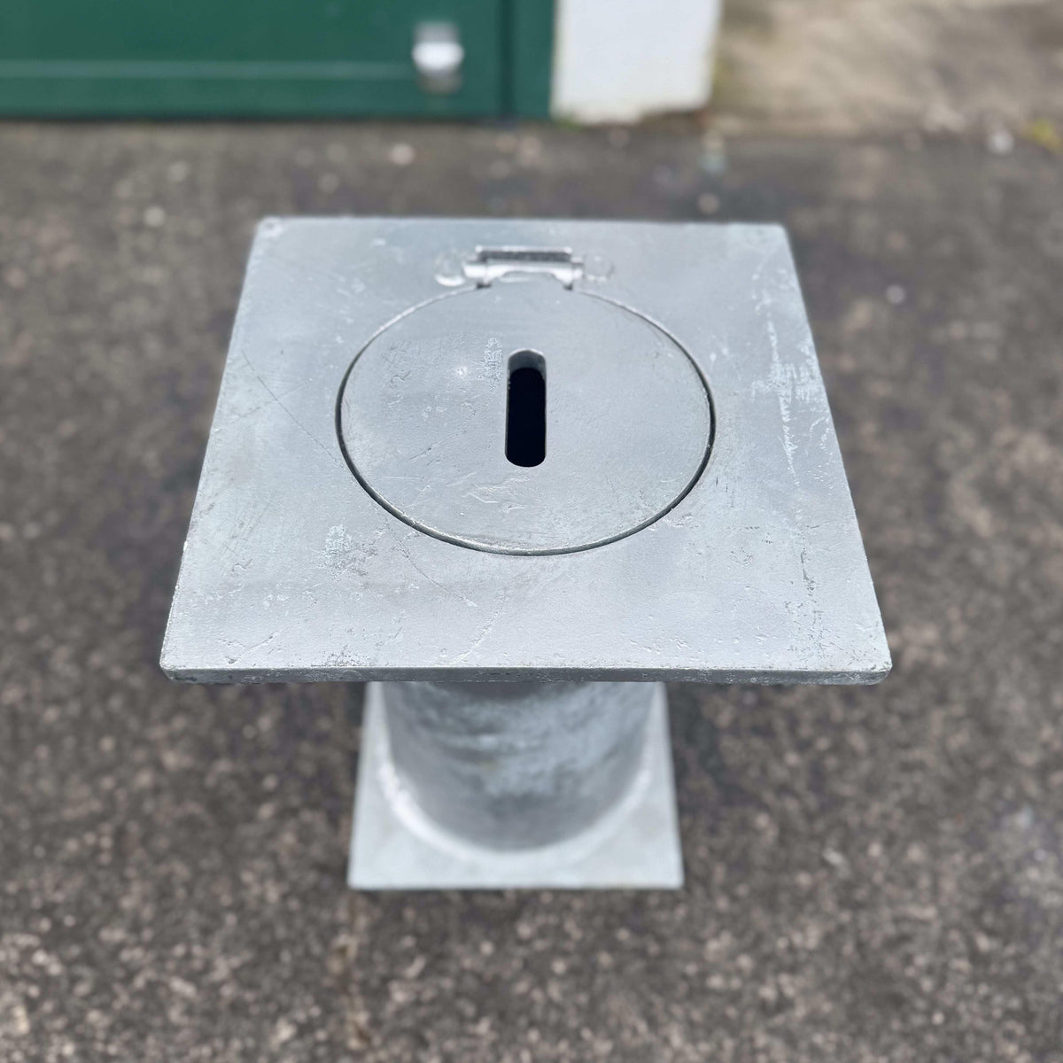 Removable bollards pipe and base set installed in residential driveway
