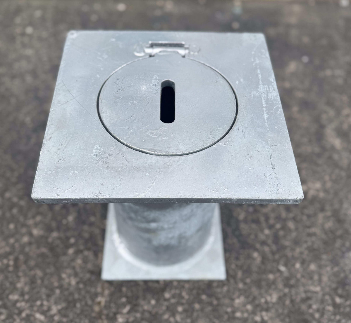Removable bollards pipe and base set installed in residential driveway
