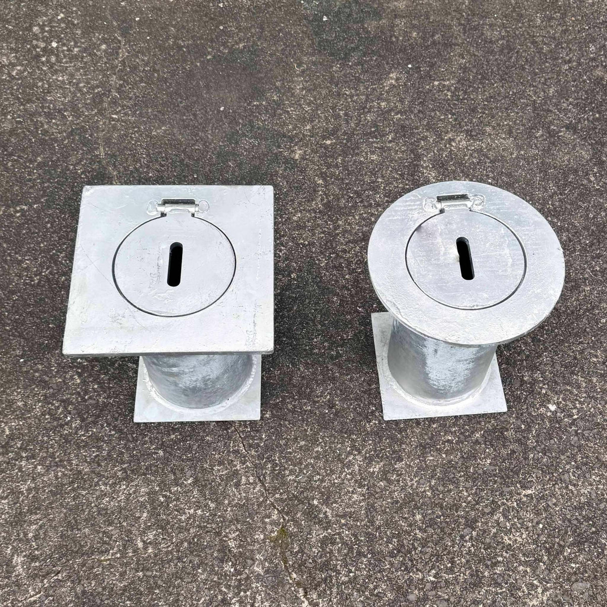 Removable bollards pipe and base set installed in residential driveway