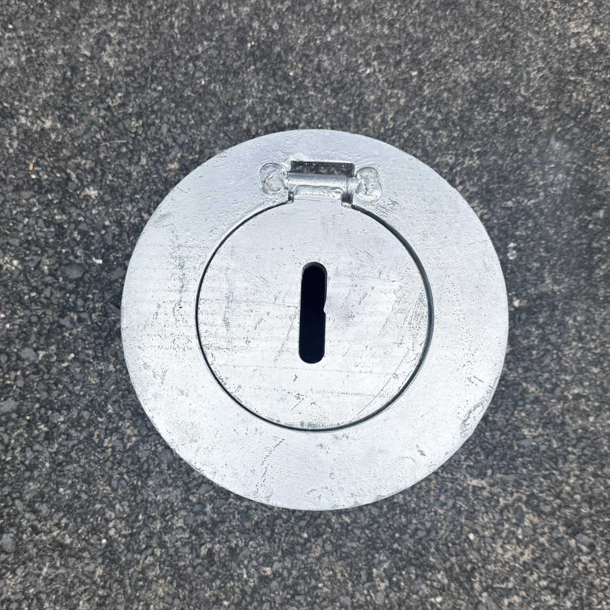 Removable bollard base housing with galvanised round plate for concrete installation