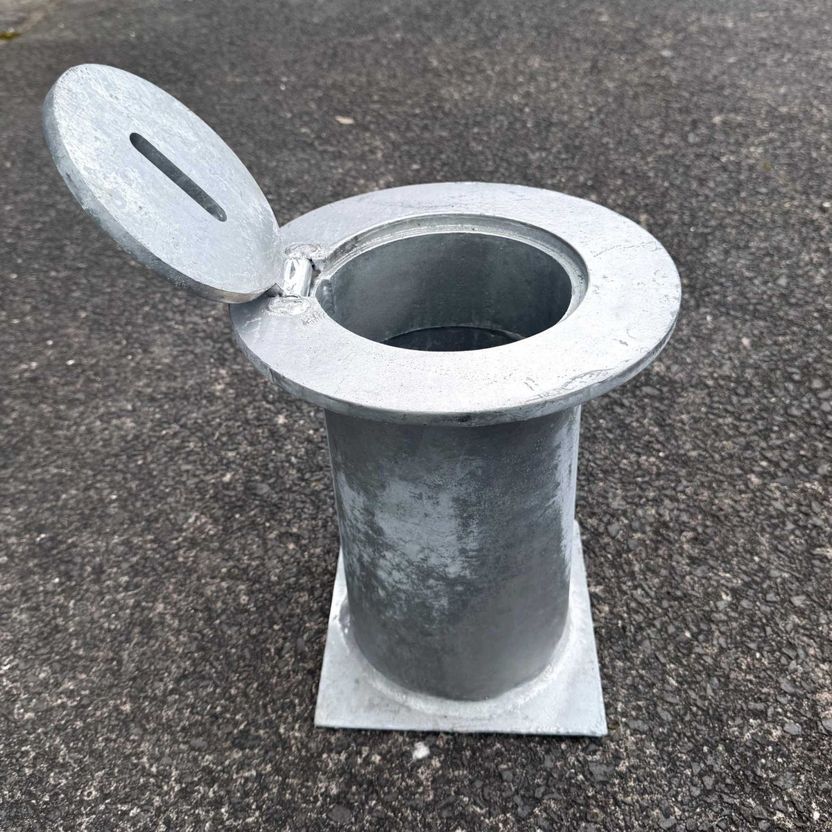 Removable bollard base housing with galvanised round plate for concrete installation