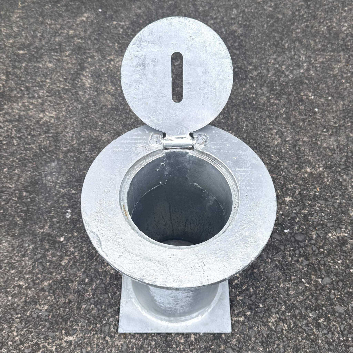 Removable bollard base housing with galvanised round plate for concrete installation