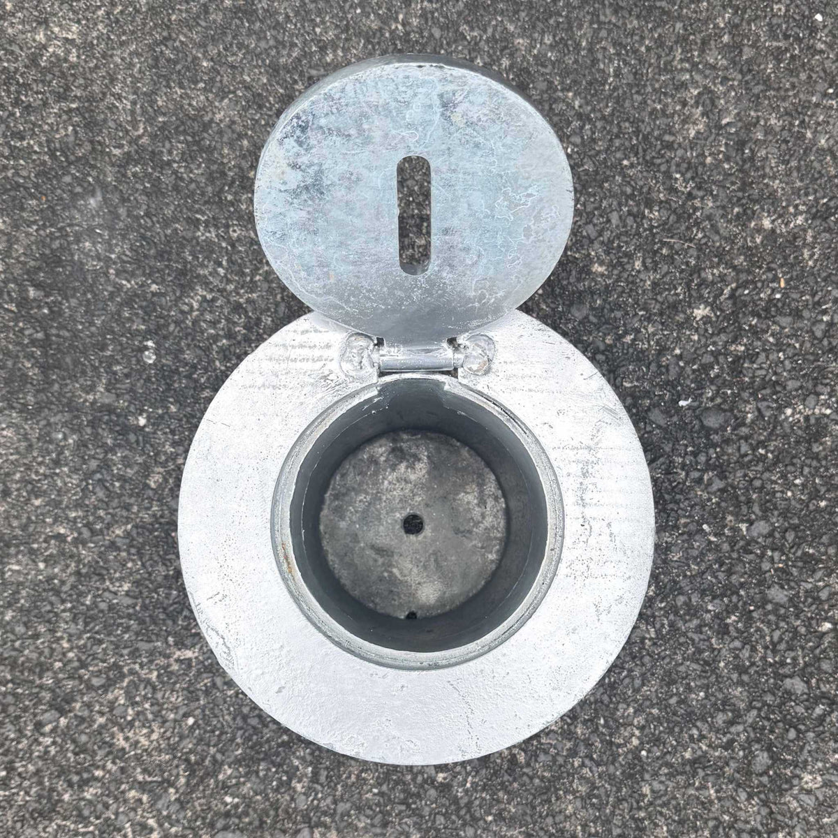 Removable bollard base housing with galvanised round plate for concrete installation