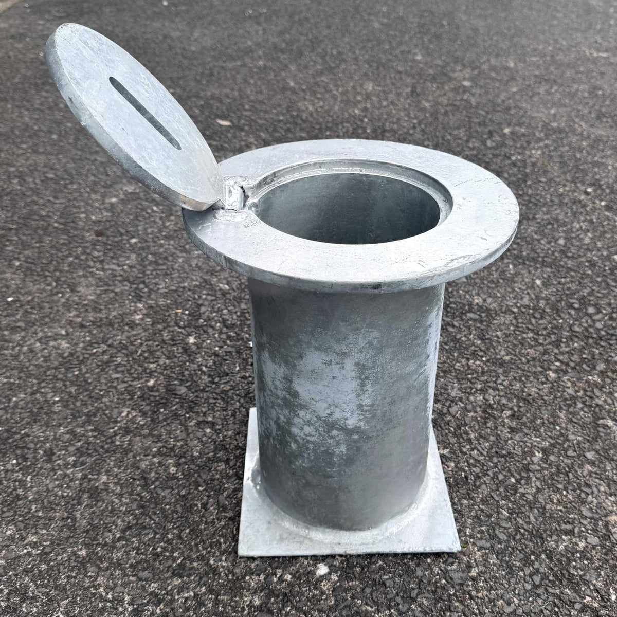 Removable bollards pipe and base set installed in residential driveway