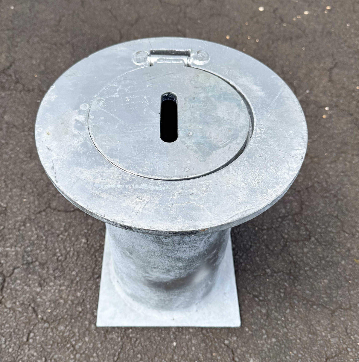 Removable bollard base housing with galvanised round plate for concrete installation