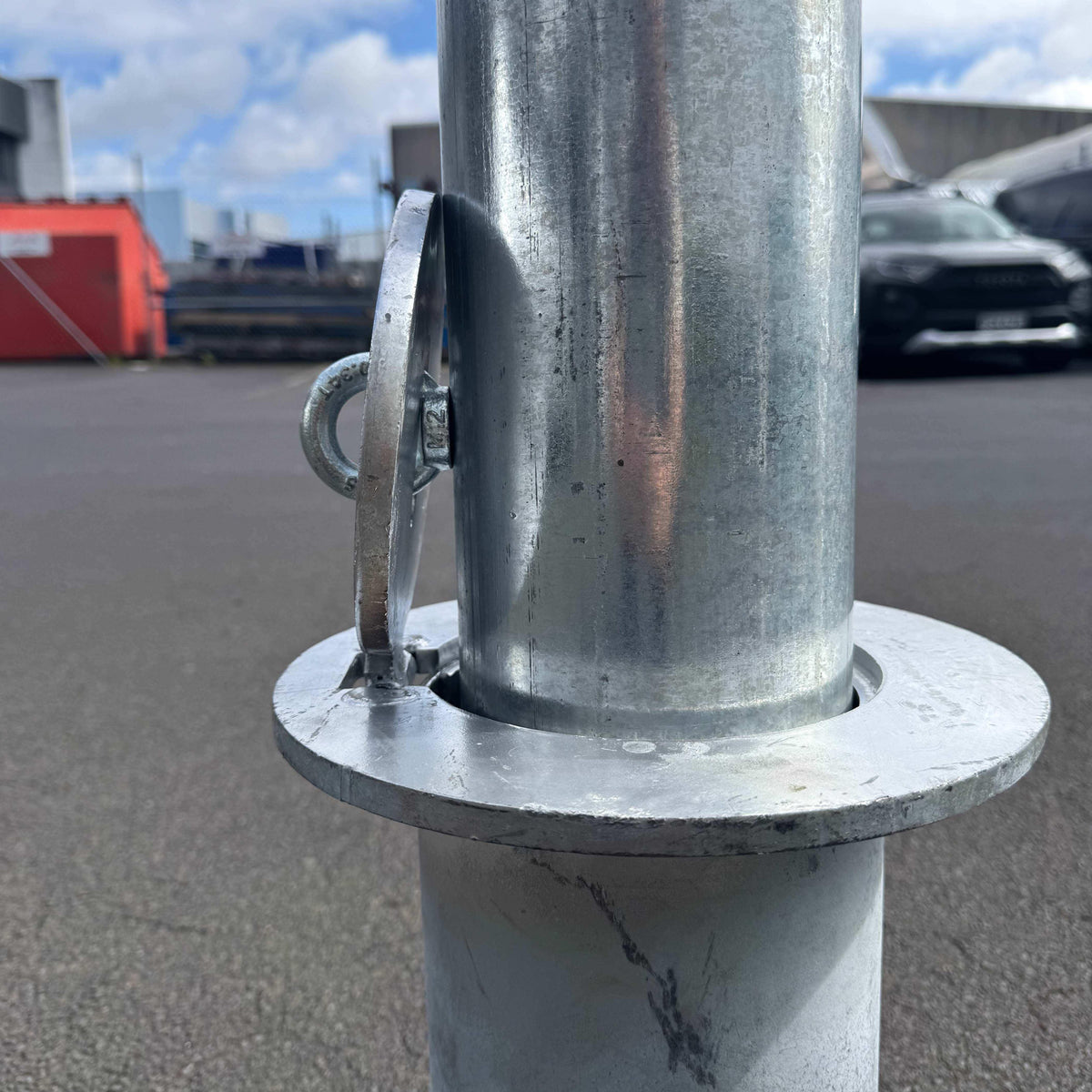 Removable bollards pipe and base set installed in residential driveway