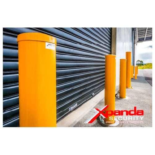 Removable bollards pipe and base set installed in residential driveway