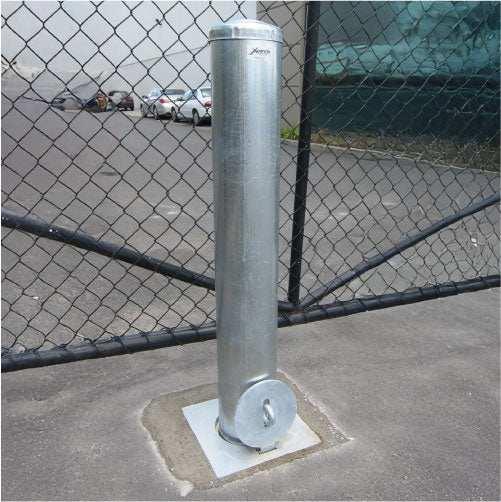 Removable bollards pipe and base set installed in residential driveway