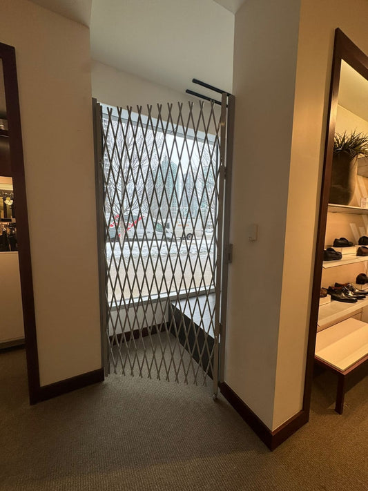 Saftidor retractable security grille installed on residential doorway