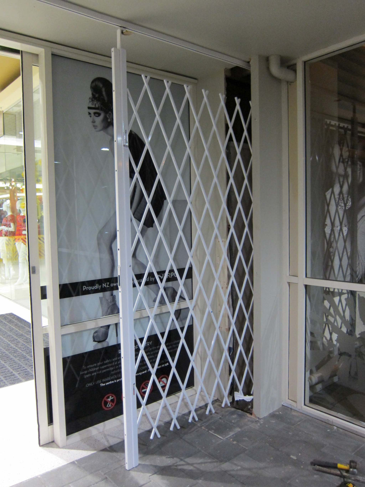 Saftidor retractable security grille installed on residential doorway