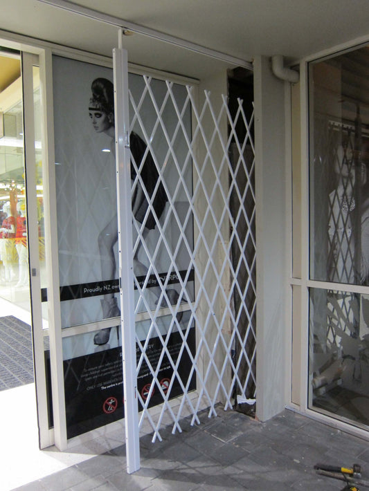 Saftidor retractable security grille installed on residential doorway