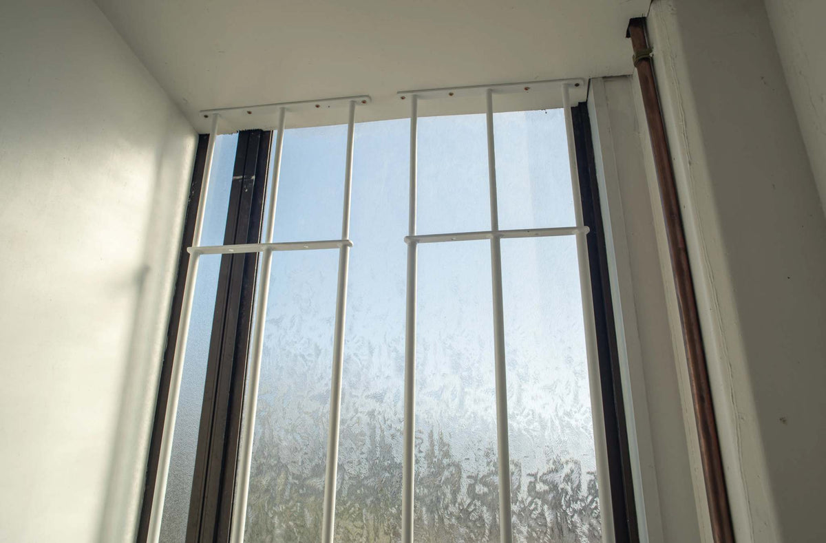 Extendable window bars with 3 round steel security bars for residential window protection