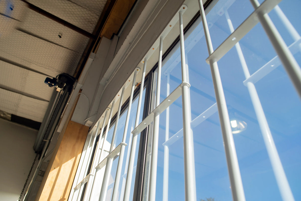 Extendable window bars with 3 round steel security bars for residential window protection