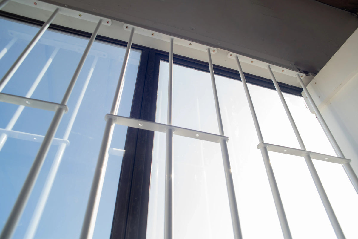 Extendable window bars with 3 round steel security bars for residential window protection