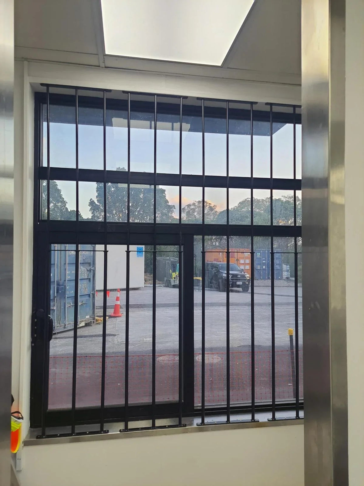 Extendable window bars with 3 round steel security bars for residential window protection