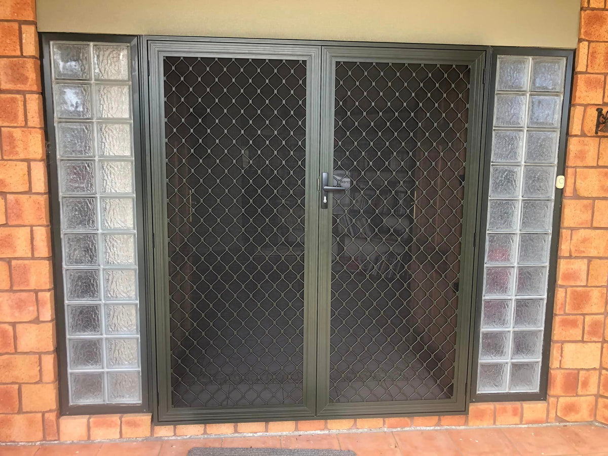 Amplimesh security screen installed on residential doorway