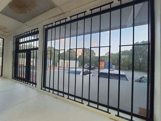 How much gap should I leave with a DIY security window bar?