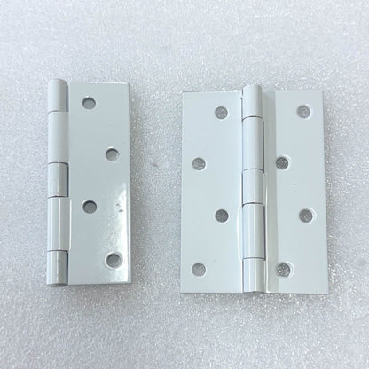Hinges of the Saftidor retractable security grille installed on residential doorway