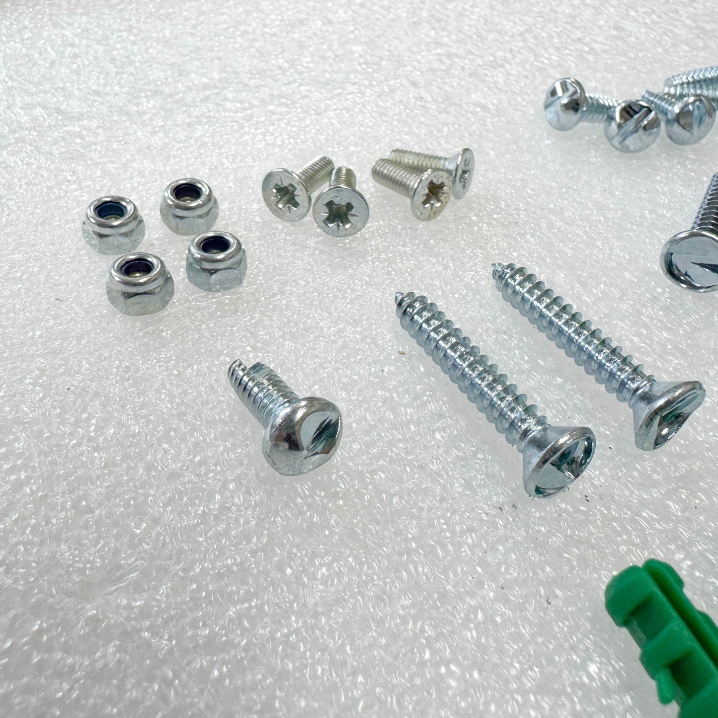 Fixings of the Saftidor retractable security grille installed on residential doorway