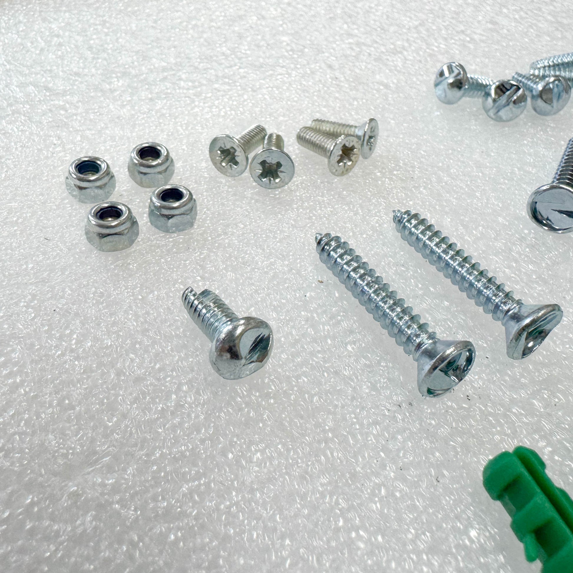 Fixings of the Saftidor retractable security grille installed on residential doorway