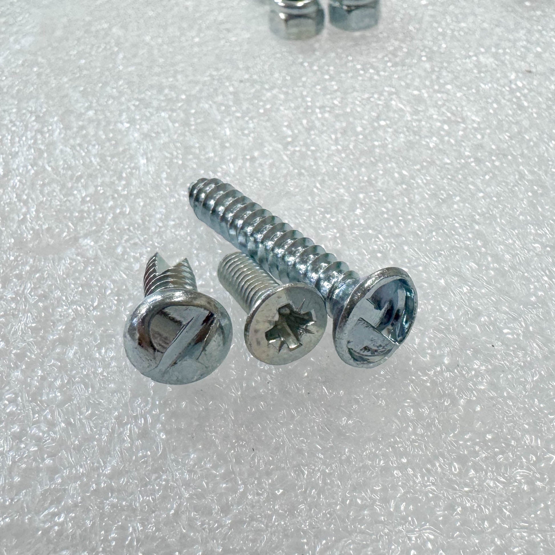 Fixings of the Saftidor retractable security grille installed on residential doorway