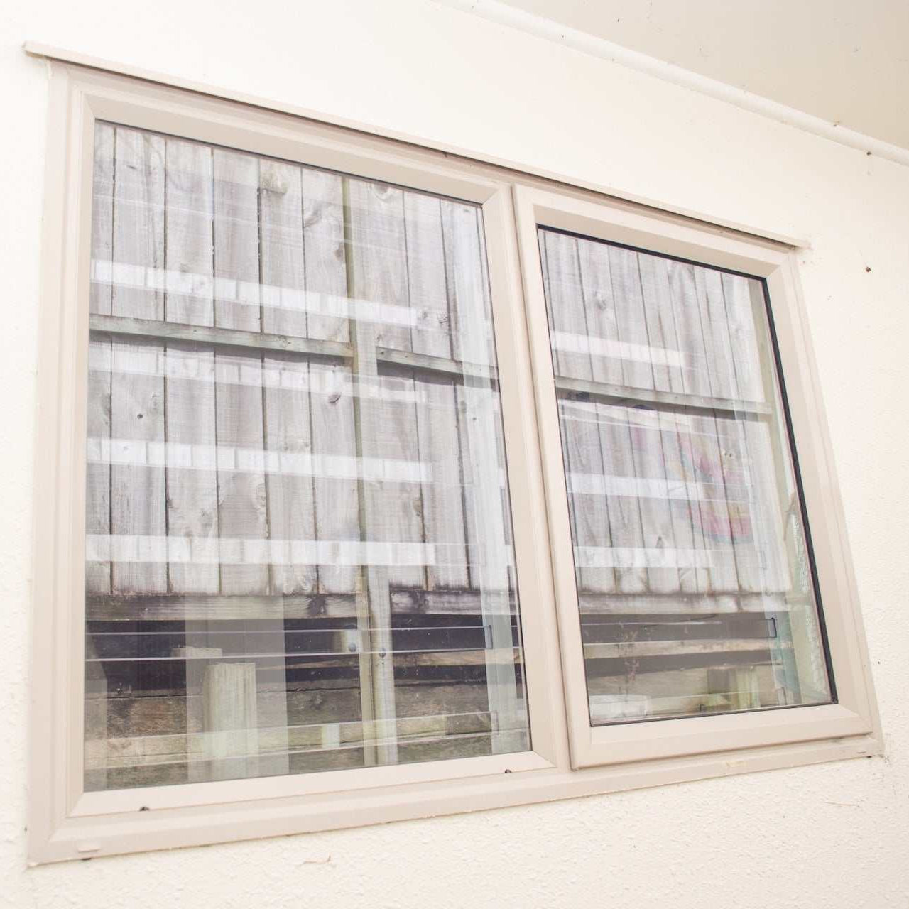 Clear Guard transparent window protection installed on residential window