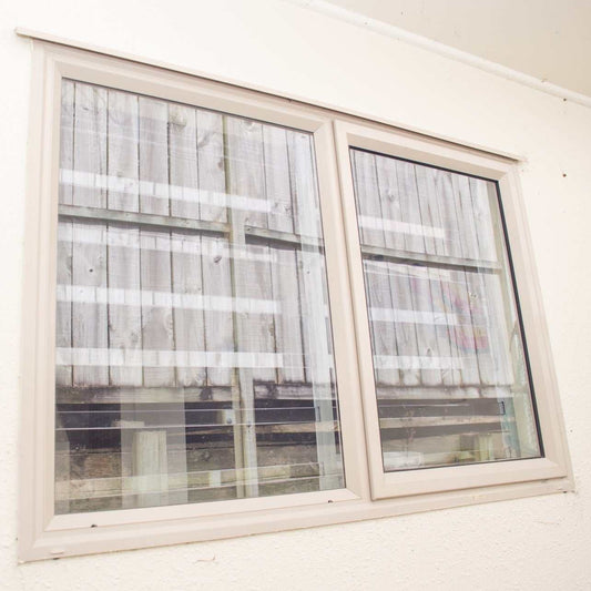 Clear Guard transparent window protection installed on residential window