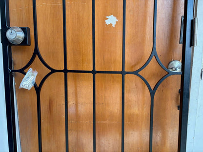 Fixed swing security gate with decorative centre design - close up