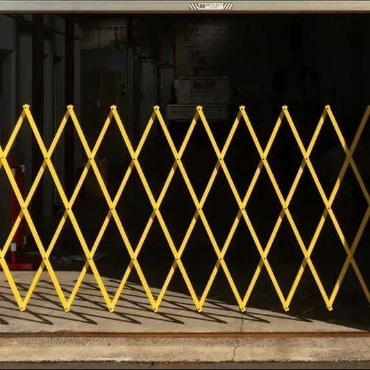 Yellow expandable barrier adjustable scissor gate barrier available for Pedestrian Barrier Rental as well